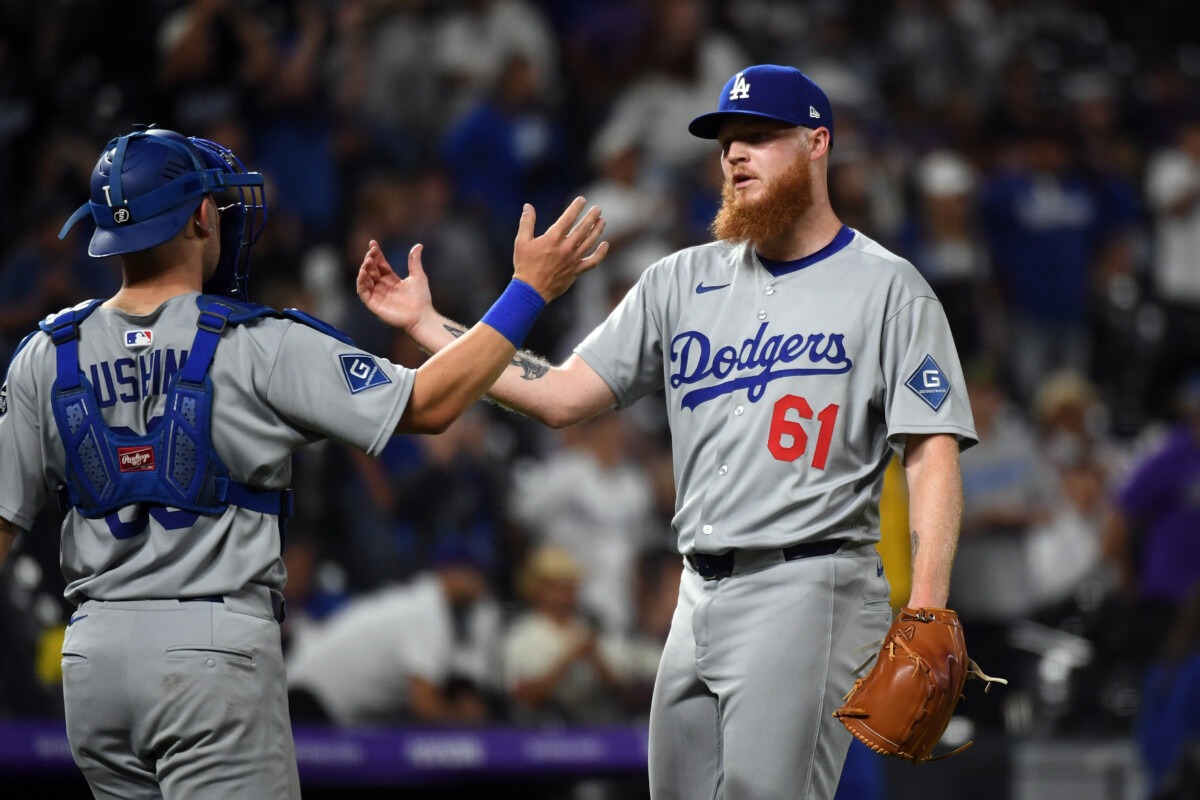 Will Klein high-fiving a teammate after his standout relief performance in Game 3 of the 2025 World Series.