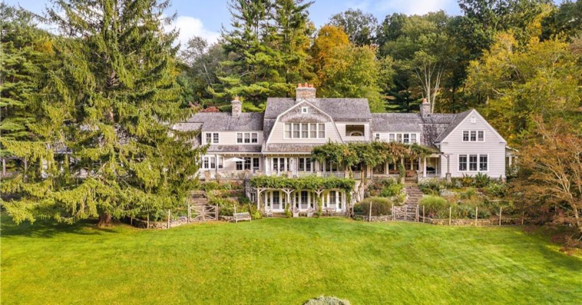 Exterior view of Richard Gere’s sprawling New York compound, showcasing its grand architecture and landscaped grounds.
