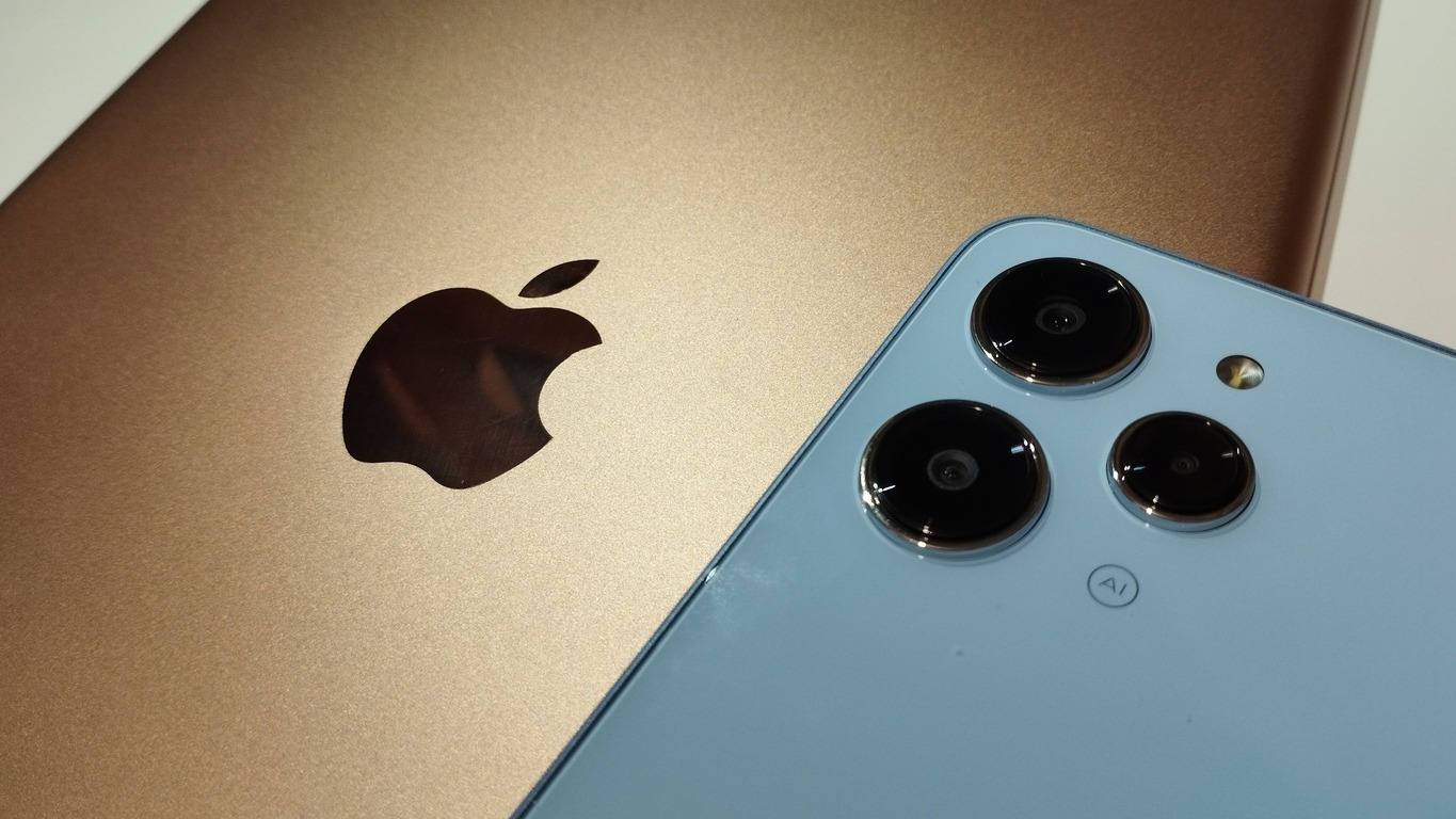 gold ipad and xiaomi redmi 12 sky blue color.