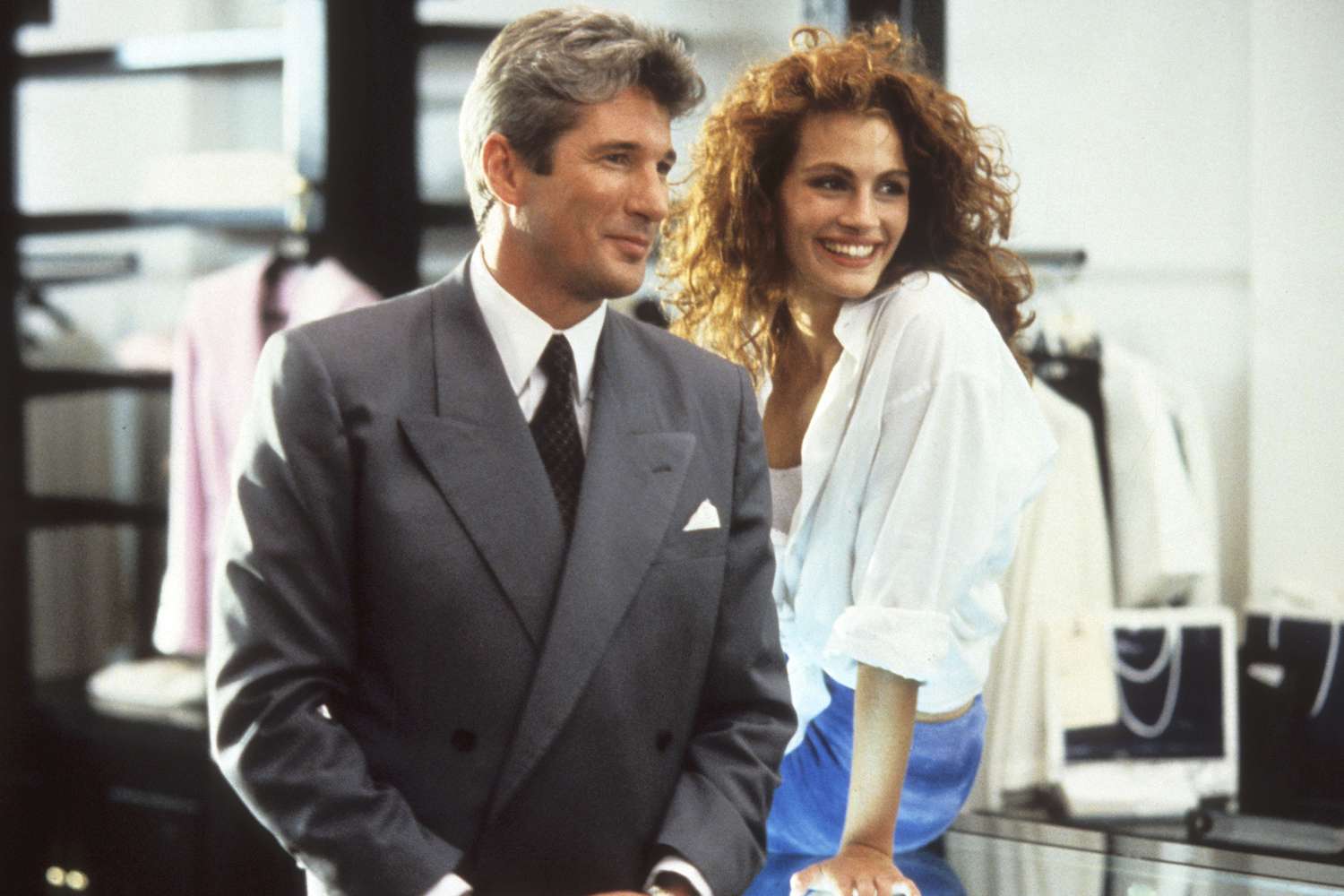 Richard Gere and Julia Roberts in a scene from Pretty Woman, sharing a memorable on-screen moment.