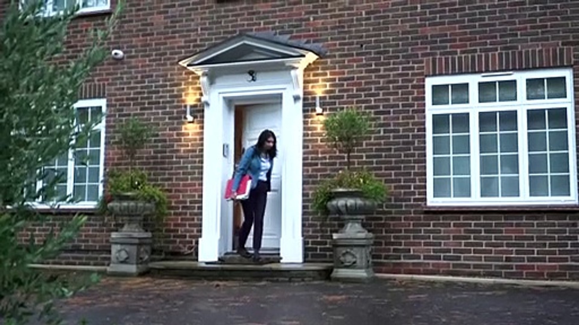 Suella Braverman leaves her family home in Fareham, a modest yet substantial residence reflecting her practical lifestyle and family-focused values.