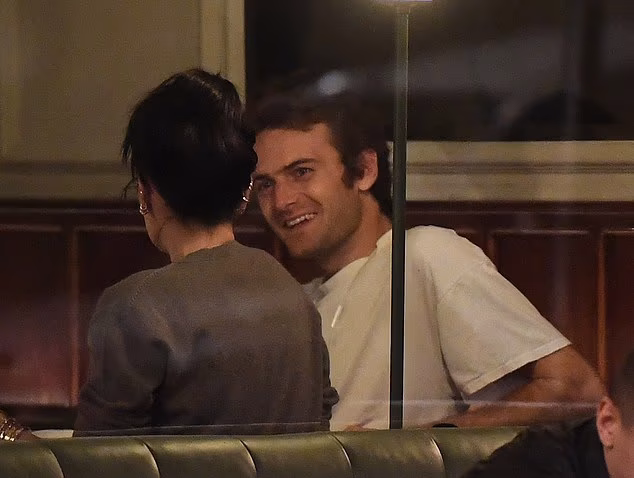 Lily Allen laughing and chatting with a mystery man during an intimate dinner date in Notting Hill, London.