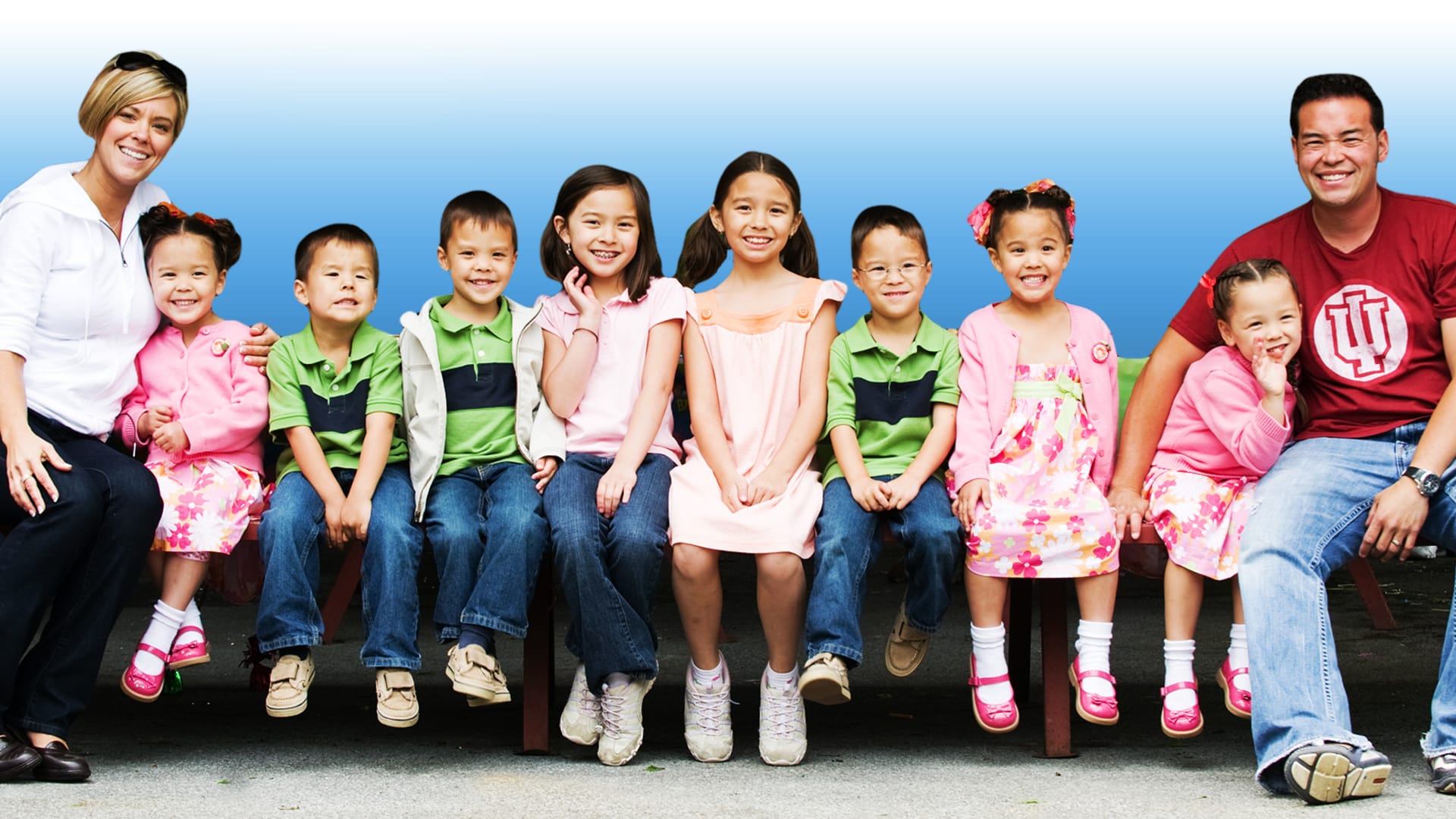 Vintage poster of Kate and Jon Gosselin with their eight children, from the reality TV show Jon & Kate Plus 8.