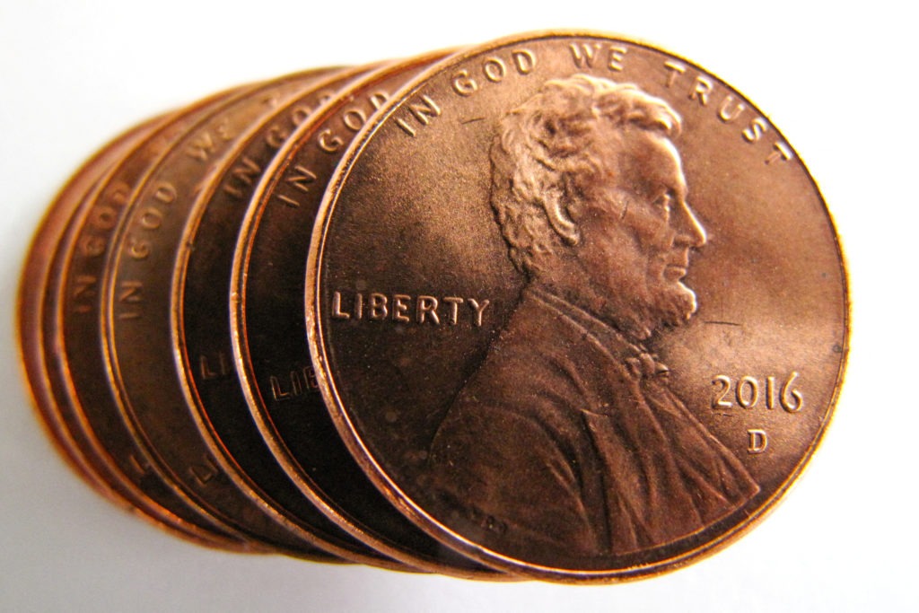 Close-up of a United States one-cent penny, showing Abraham Lincoln’s profile on the obverse side of the coin.