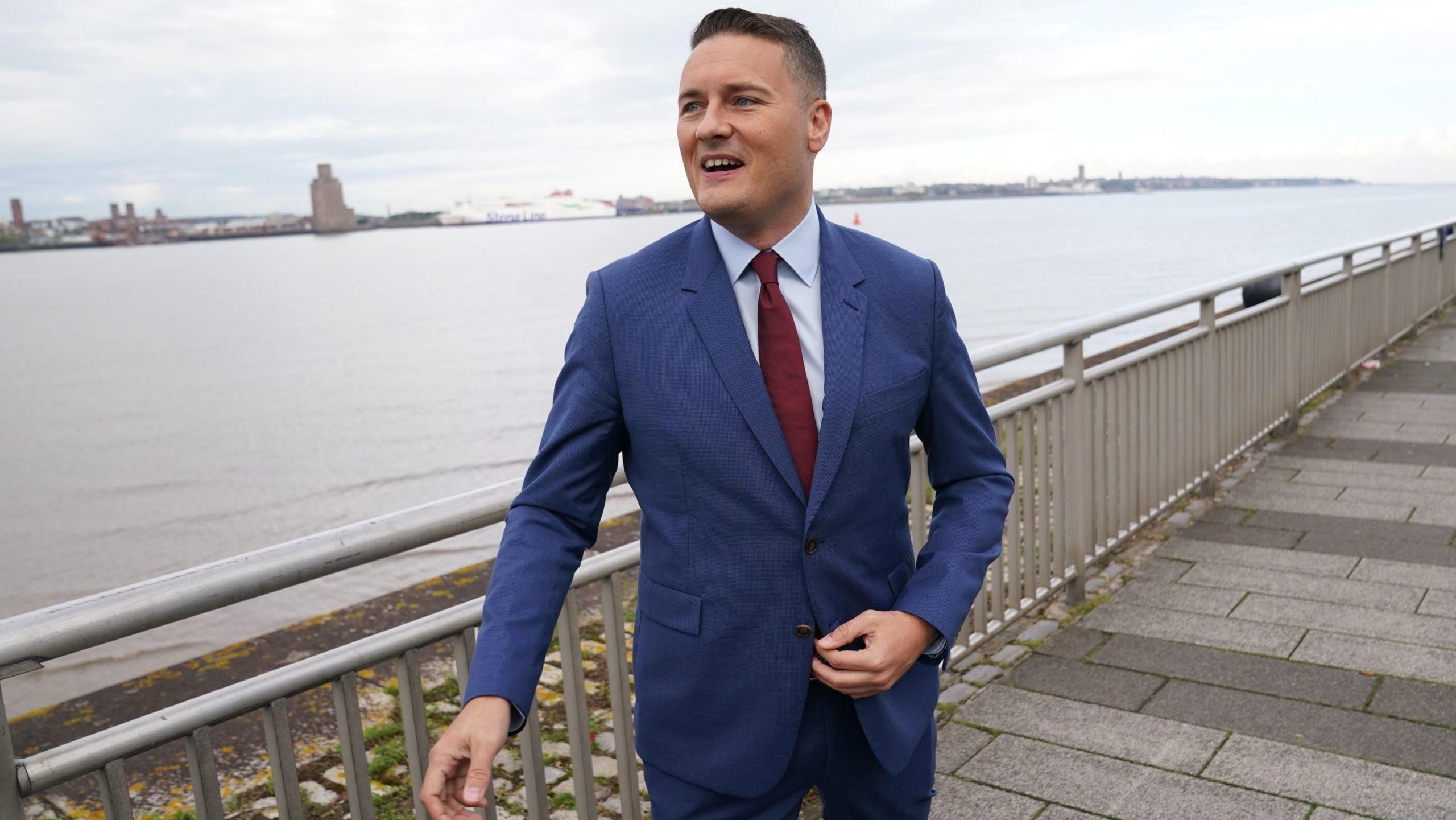 Wes Streeting smiling by the seaside during a campaign stop, greeting supporters as he takes a brief moment away from the Westminster drama.