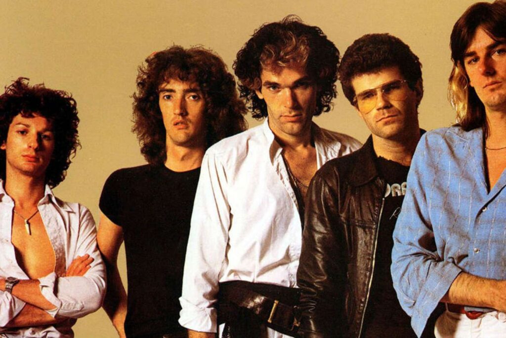 The band Dragon performing on stage, with late member Robert Taylor.