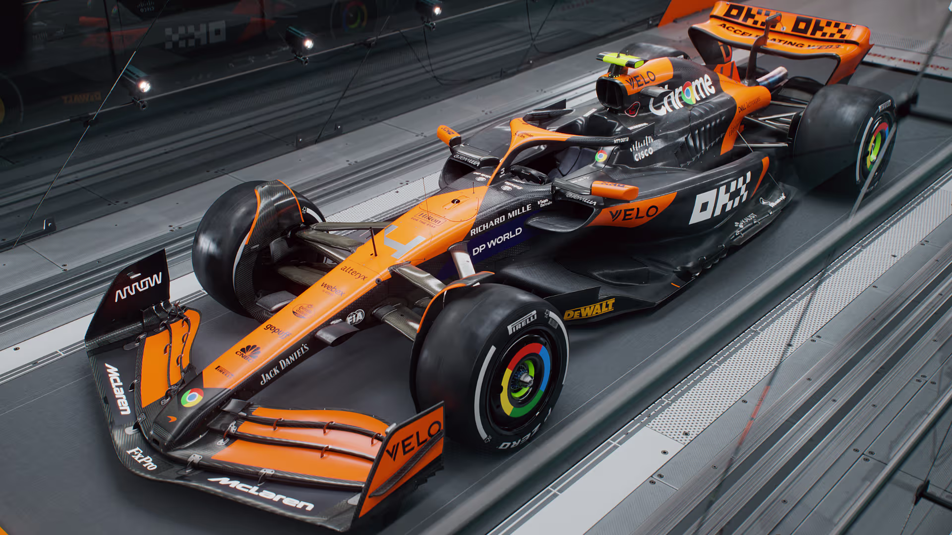 McLaren Formula 1 car speeding on the track with vibrant papaya orange livery, showcasing its design and sponsor logos.
