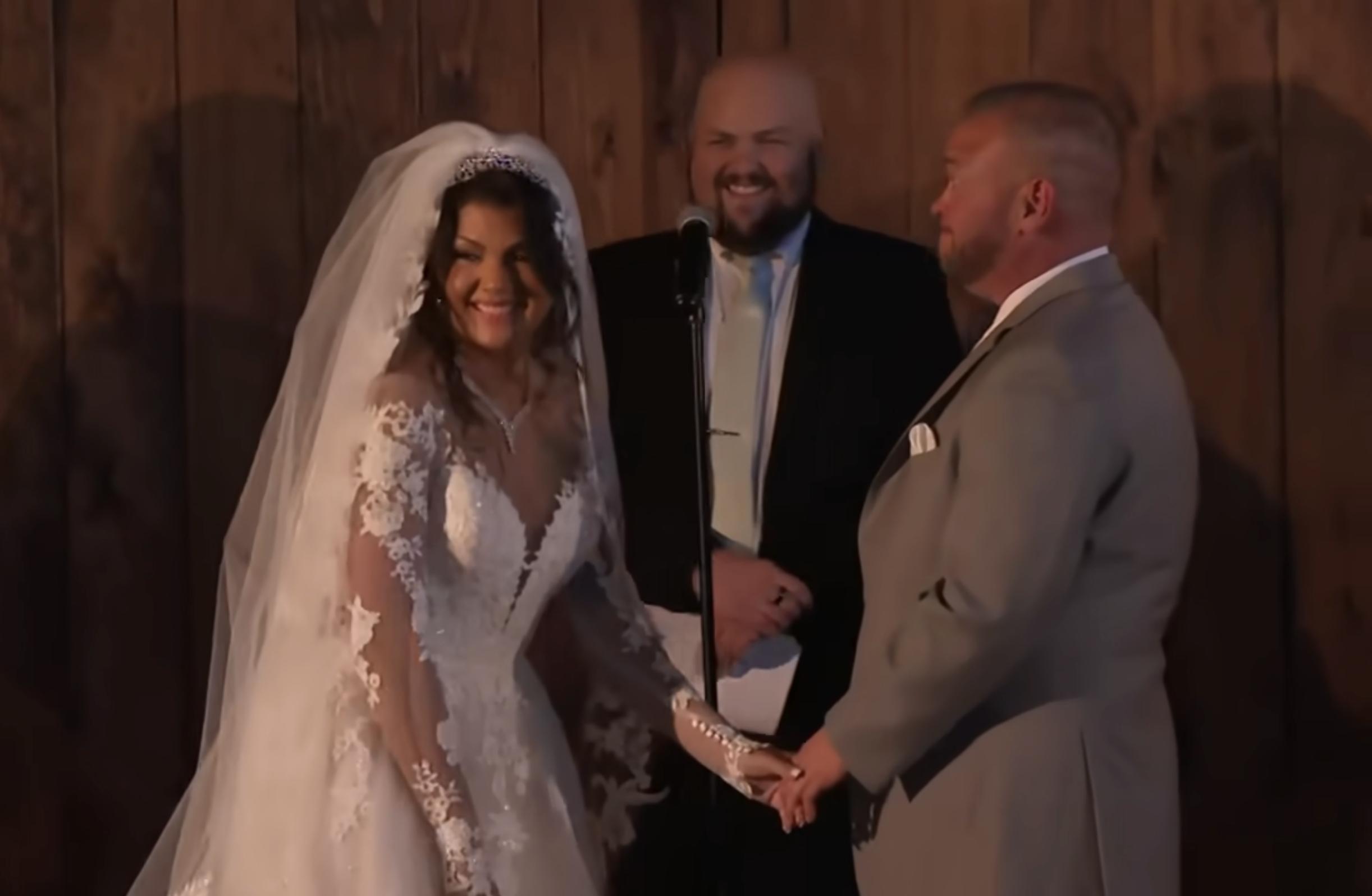 Jon Gosselin and Stephanie Lebo smiling joyfully as they exchange vows and get married, radiating happiness during their intimate Lancaster wedding ceremony.