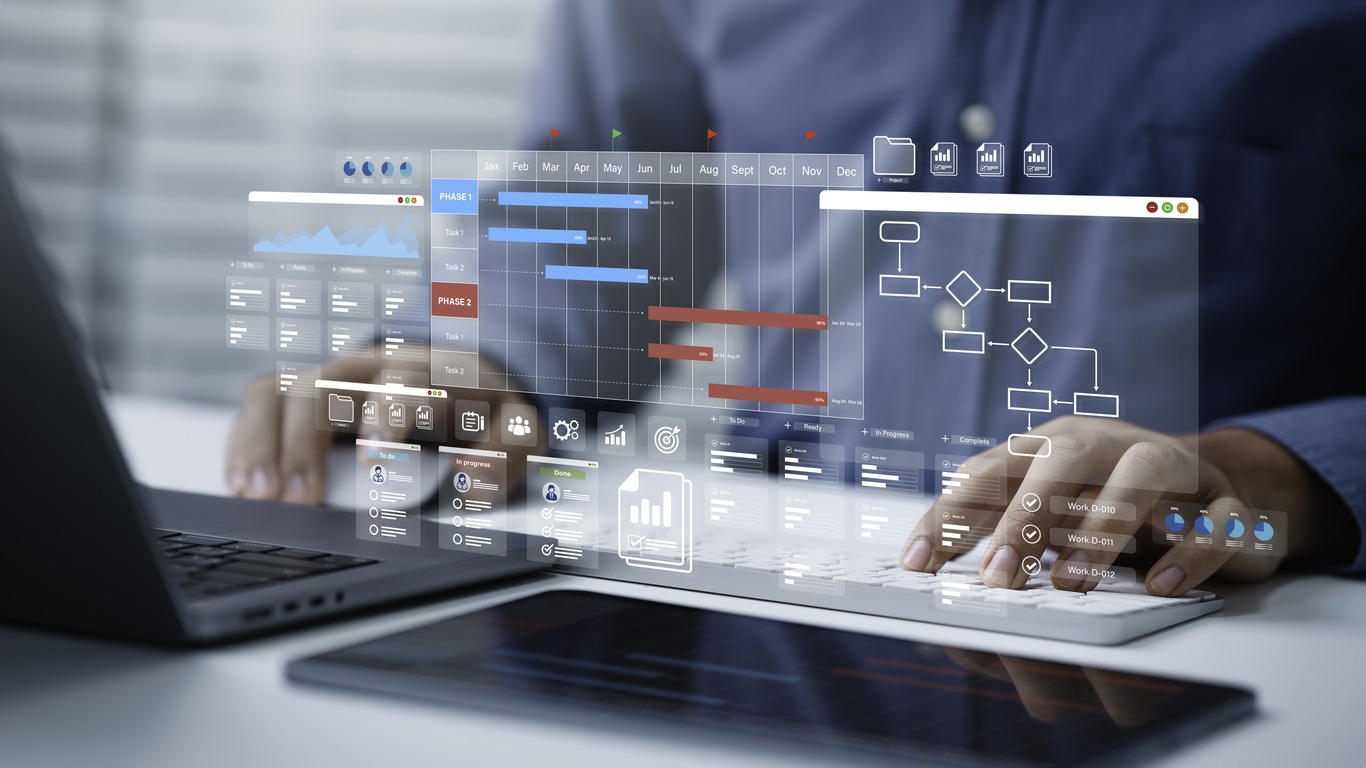project management tool concept. business people use laptop to manager working projects and update task with gantt chart schedule to business plan and progress. planning software.