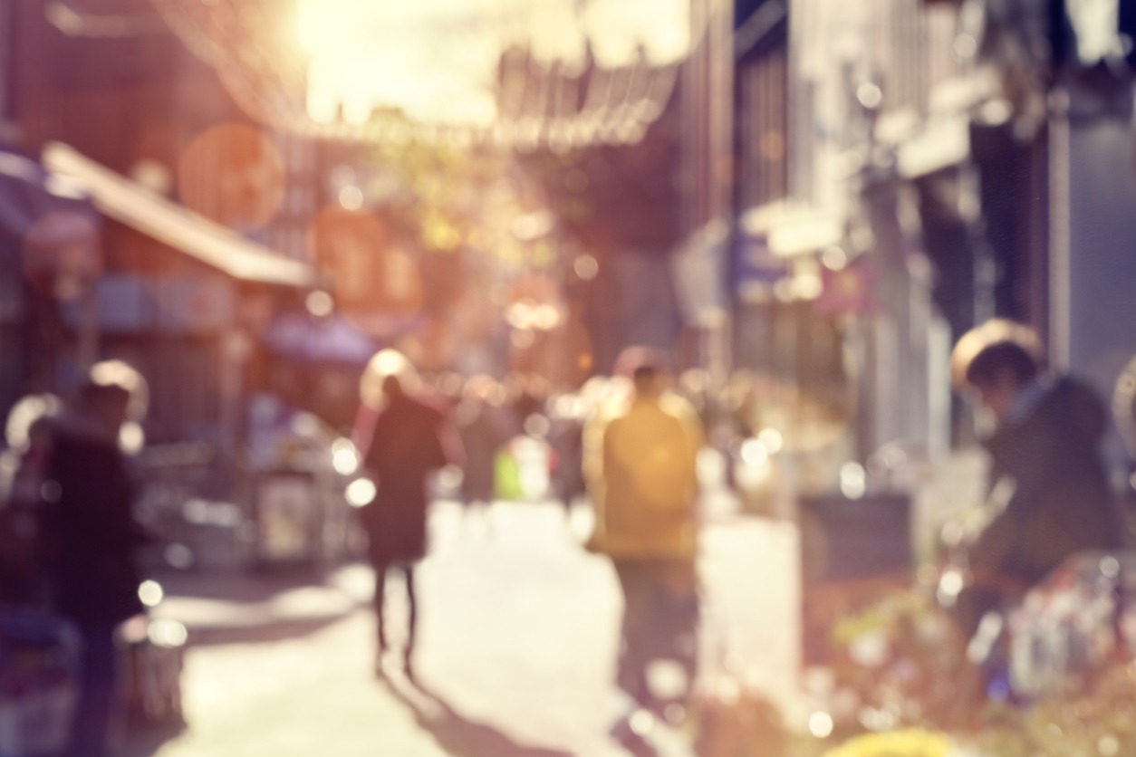 crowd of shoppers walking and shopping on a high street