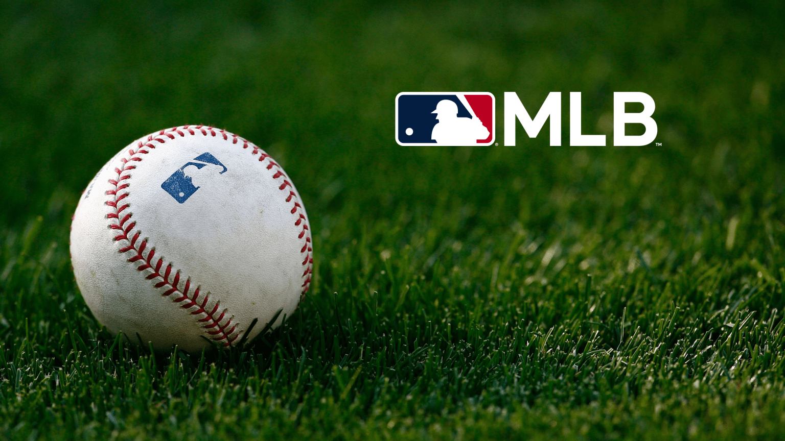 A baseball resting on grass next to the MLB logo, symbolizing Major League Baseball’s new multi-platform media deals with Netflix, ESPN, and NBCUniversal.