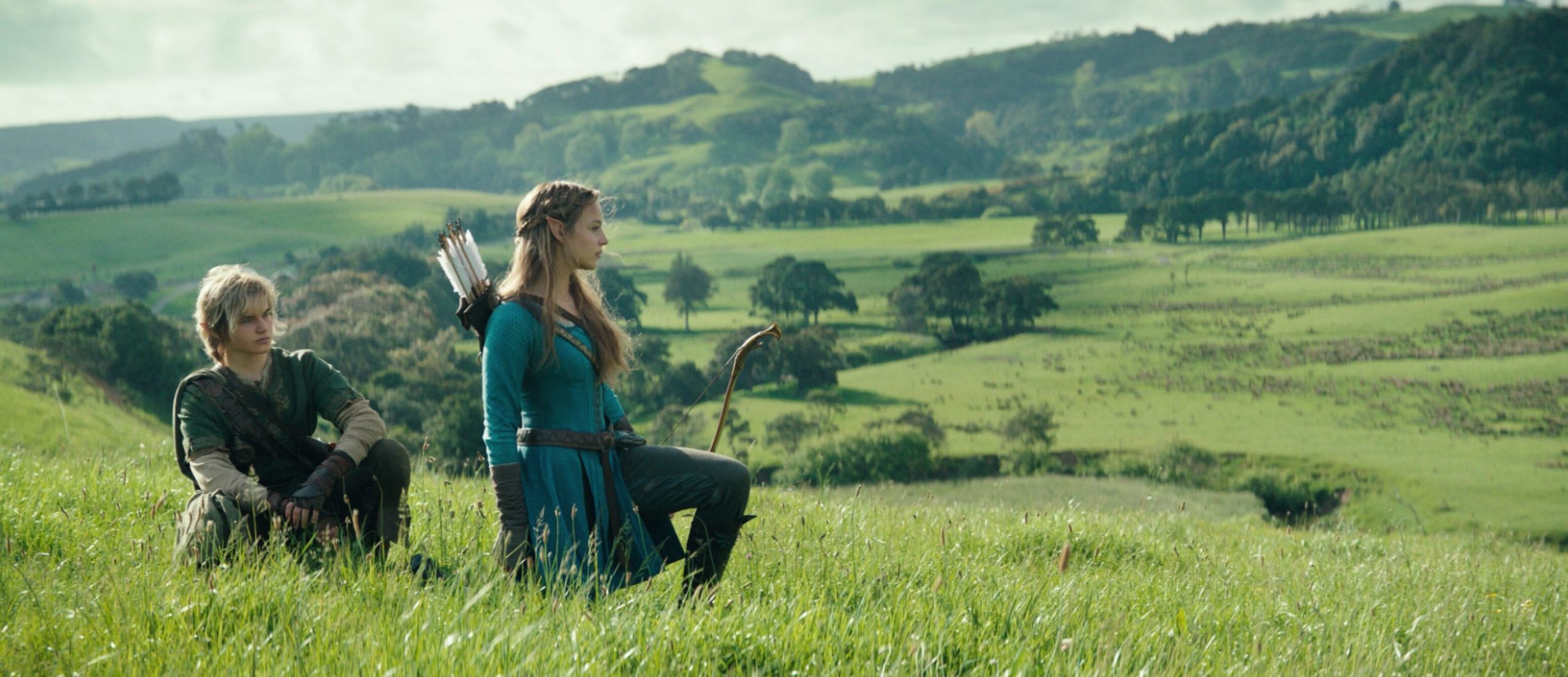 Bo Bragason as Princess Zelda and Benjamin Evan Ainsworth as Link in the first official photos from The Legend of Zelda live-action movie, standing side by side in costume.
