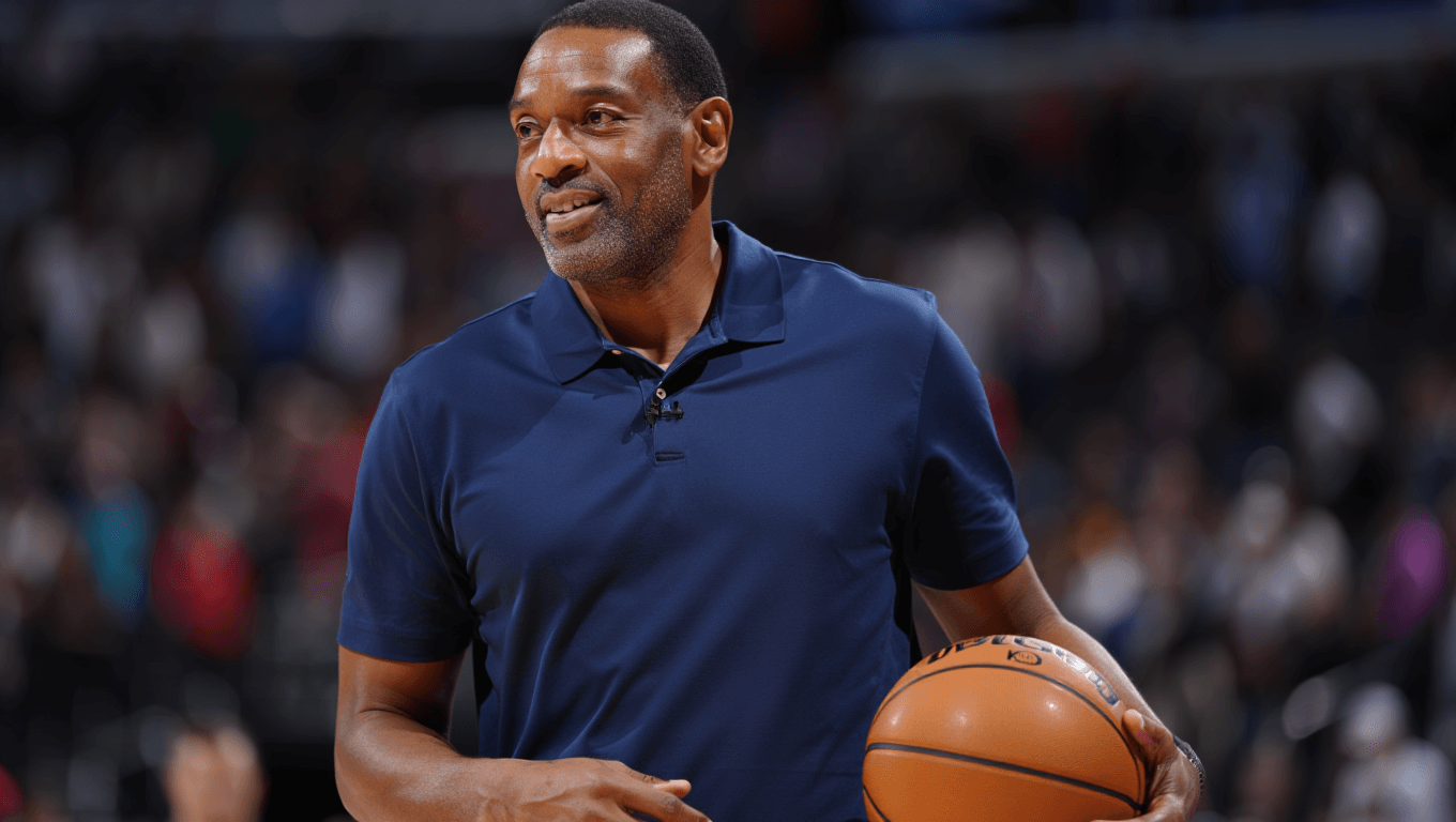 Elden Campbell walking on an NBA court post-retirement, holding a basketball and looking reflective.