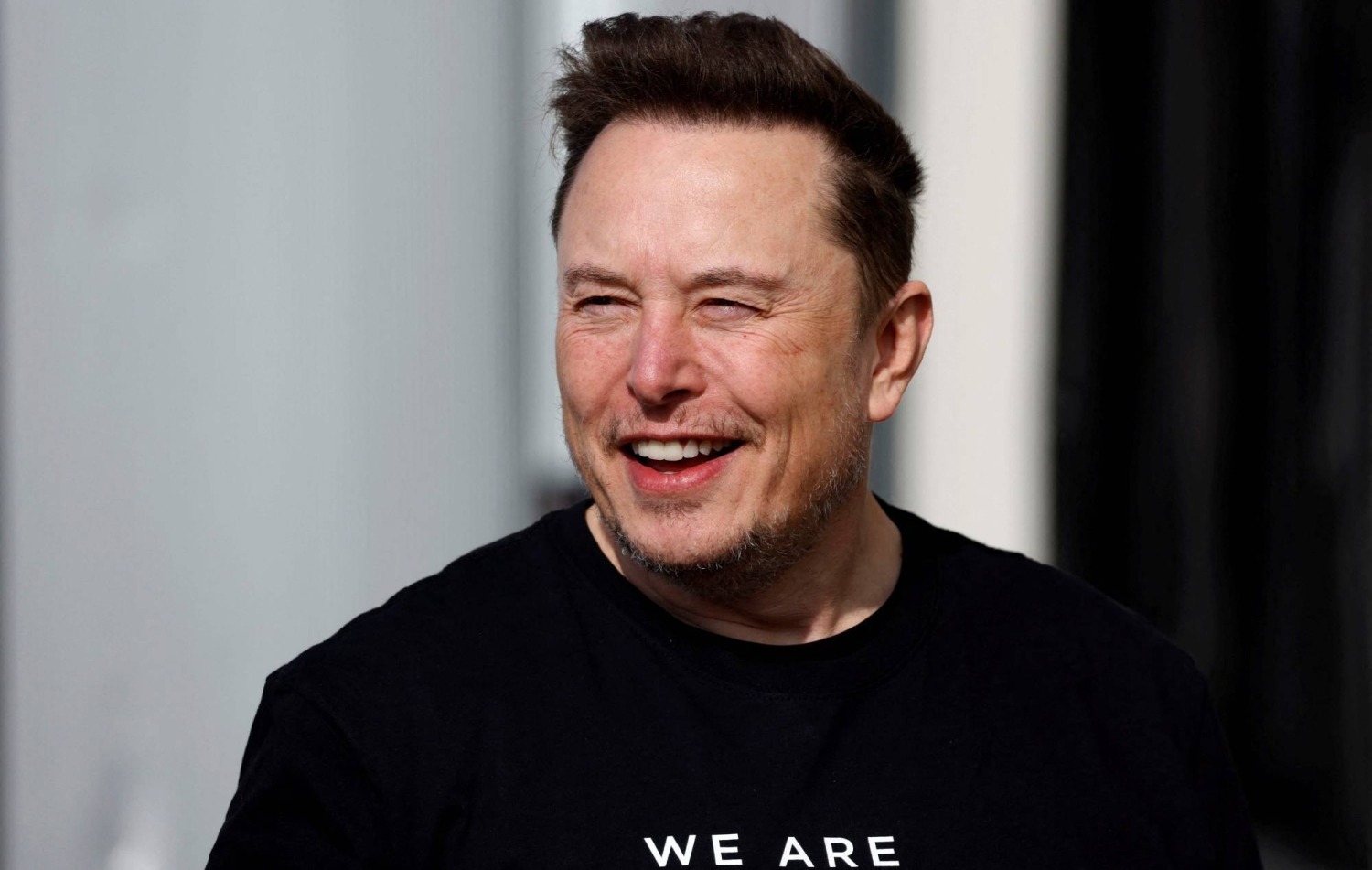 Elon Musk speaking at a technology and business event in 2026