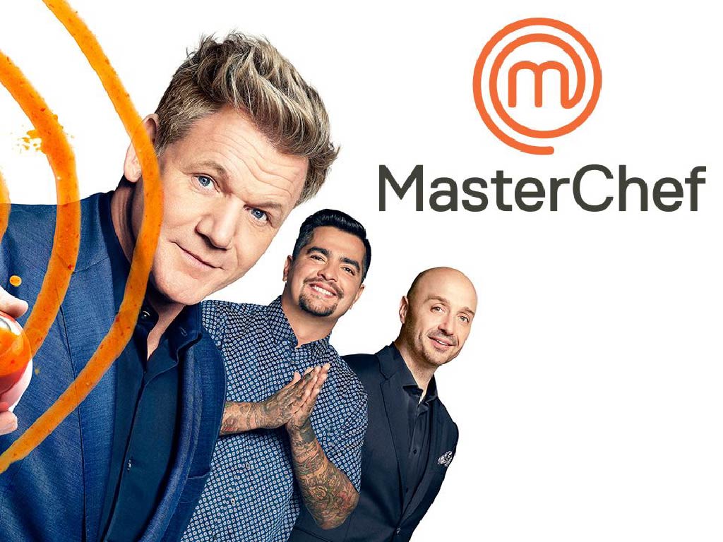 Promotional poster for MasterChef USA featuring Gordon Ramsay, standing confidently with arms crossed against a dramatic kitchen background.