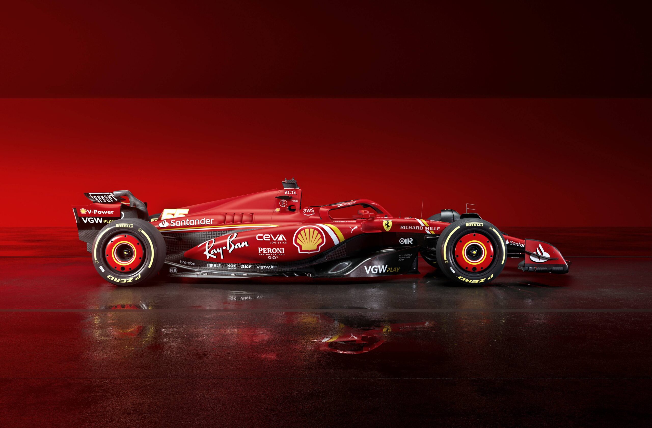 Side profile of a Ferrari Formula 1 car, showcasing its aerodynamic design, sleek red livery, and signature prancing horse logo on the race track.