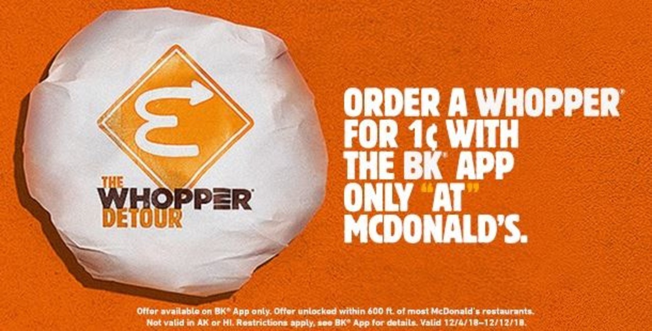 A Burger King advertisement explaining how to get a 1-cent Whopper by downloading the Burger King app and ordering while inside a McDonald’s location as part of the Whopper Detour promotion.