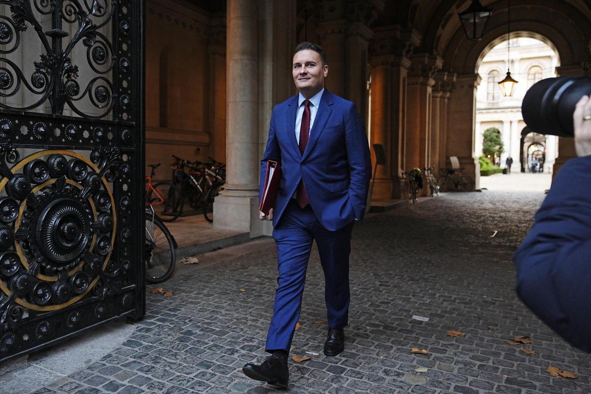 Wes Streeting, UK Health Secretary, walking out of Downing Street after announcing independent review into ADHD, autism, and mental health diagnoses.