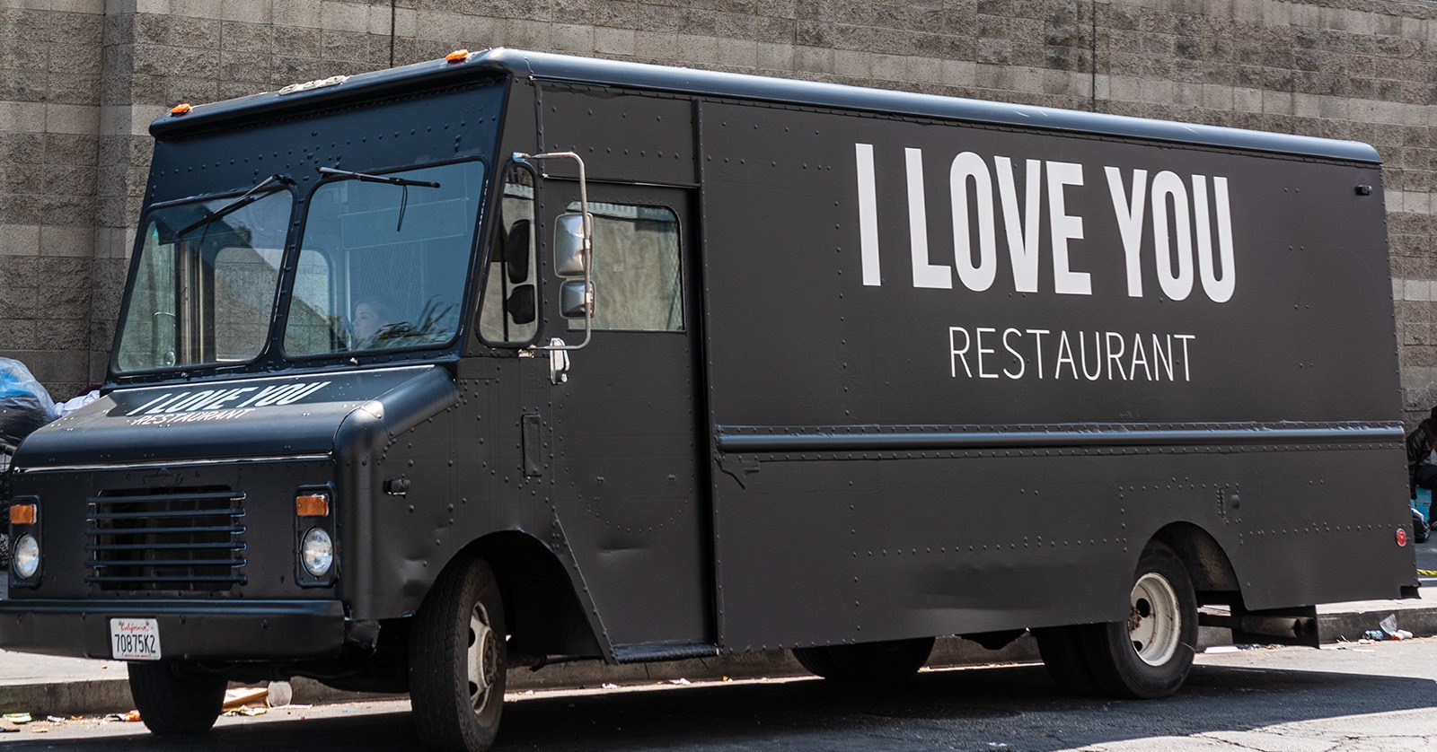 The I Love You food truck parked on Skid Row, Los Angeles, serving meals to those in need as part of Jaden Smith’s generosity-driven initiative.