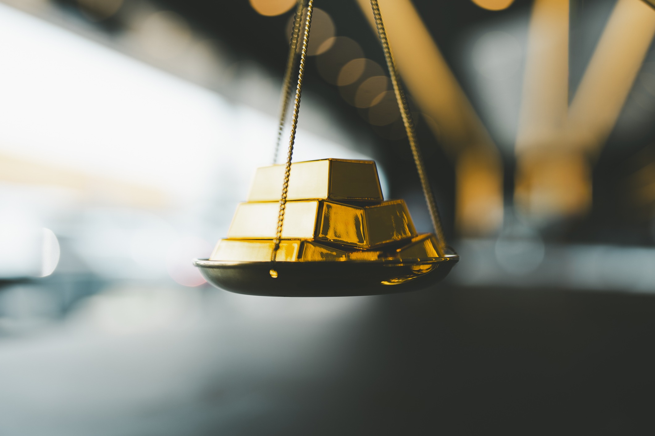 gold with balance scale. money management, financial plan, time value of money, gold value and price concept.