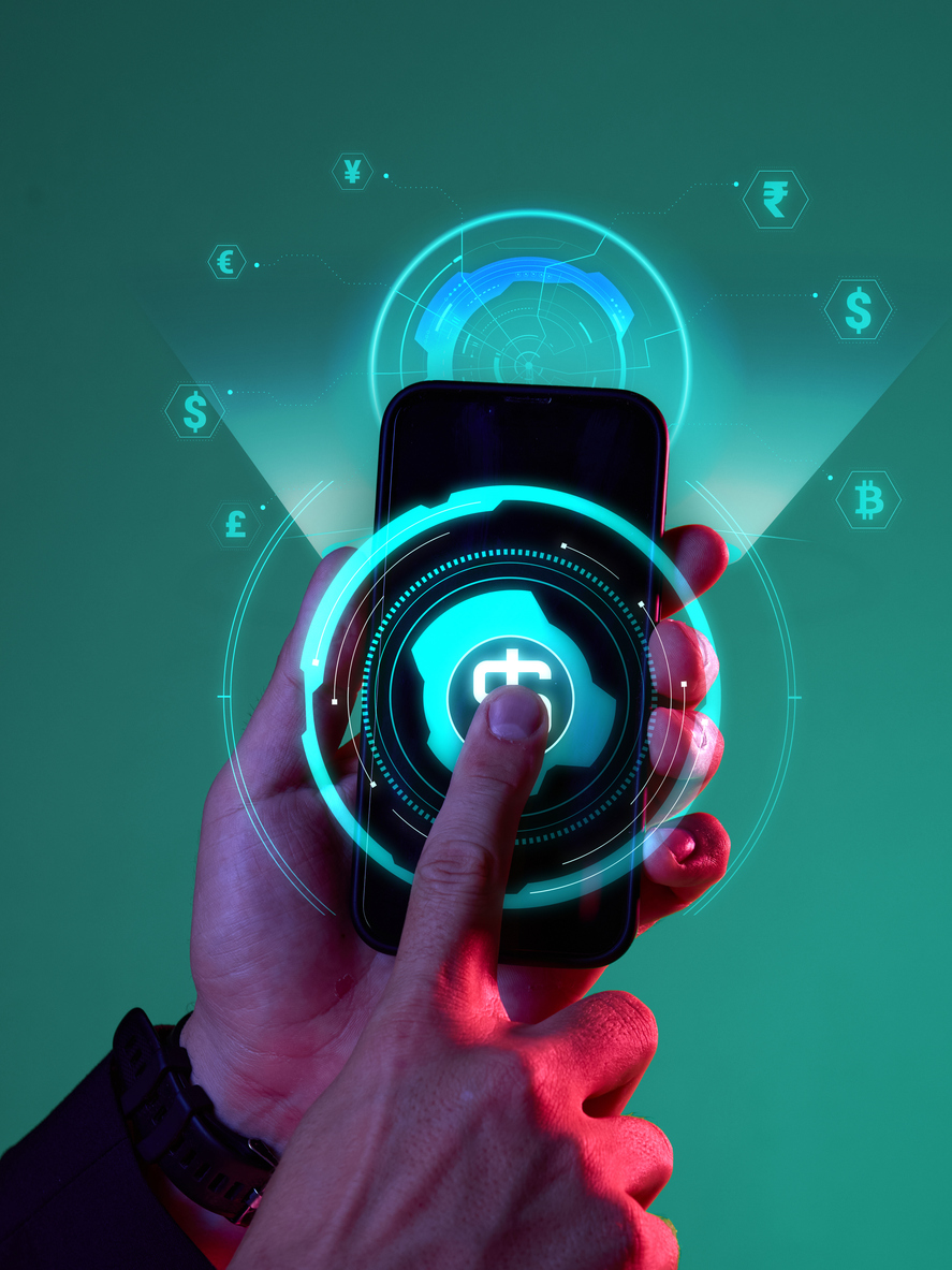 male hand touching mobile screen with virtual currency dashboard