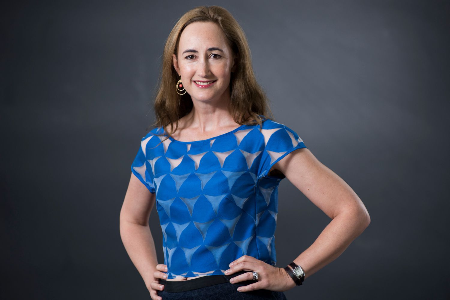 Sophie Kinsella posing for a professional studio portrait, dressed smartly with a warm, approachable expression.