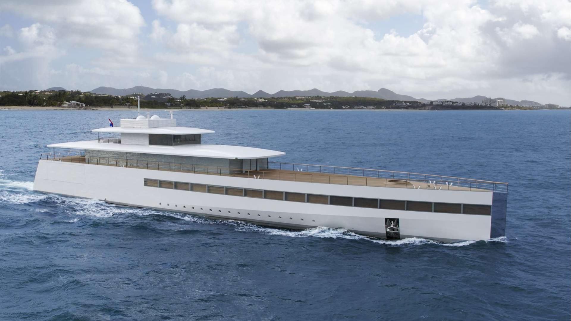 Steve Jobs' luxurious yacht, Venus, enjoying the deck with the sleek, modern vessel visible in the background.