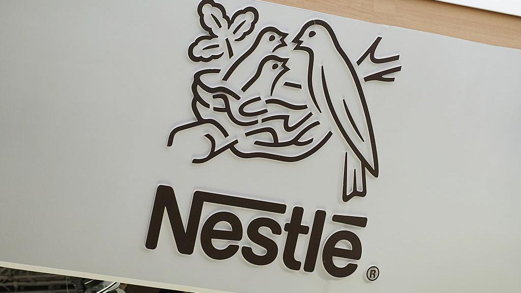 The Nestlé logo pictured as the company issues a global recall of certain baby formula products over potential toxin contamination concerns.