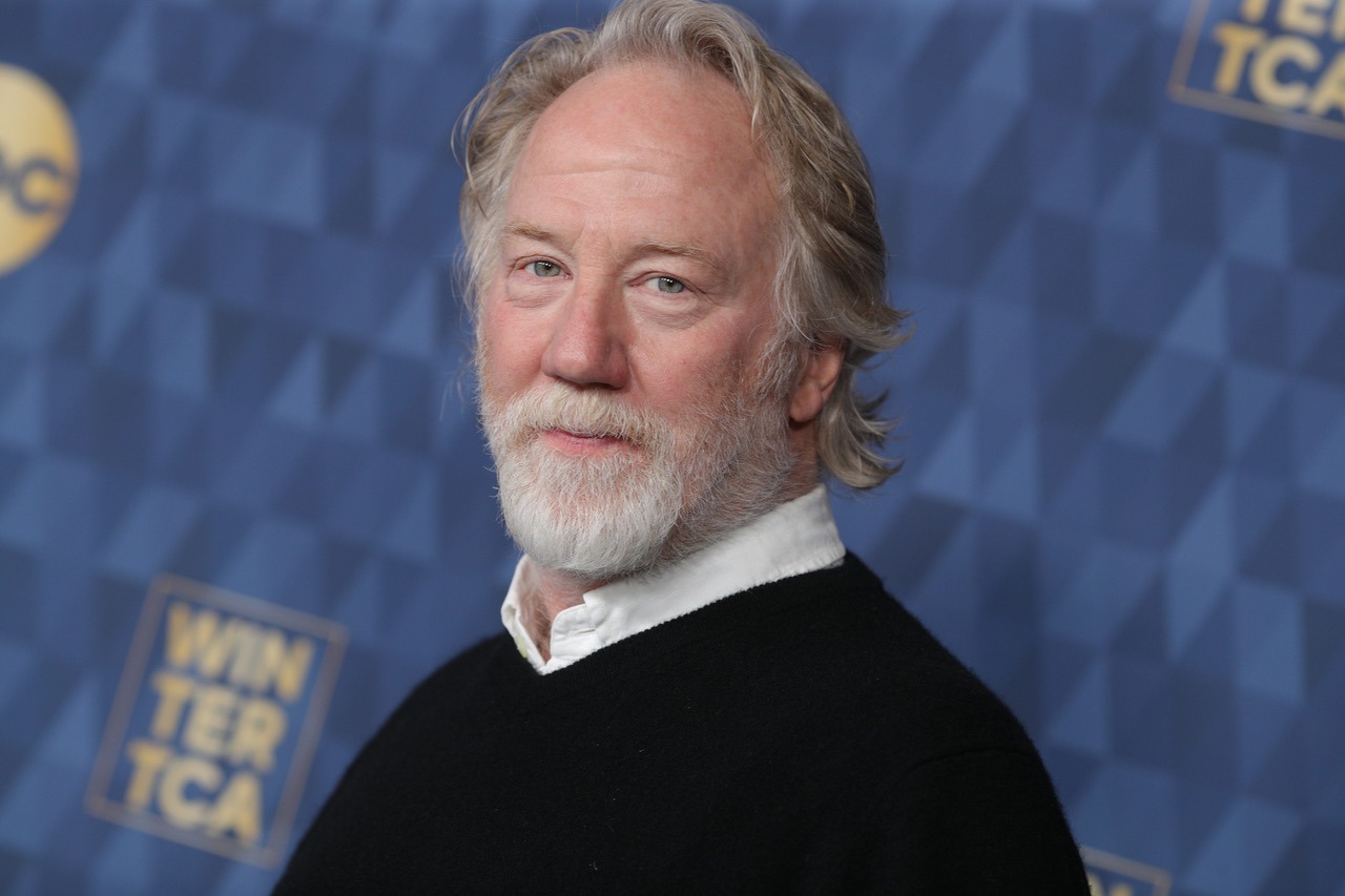 Timothy Busfield posing on the red carpet at a public event before the 2026 legal allegations surfaced