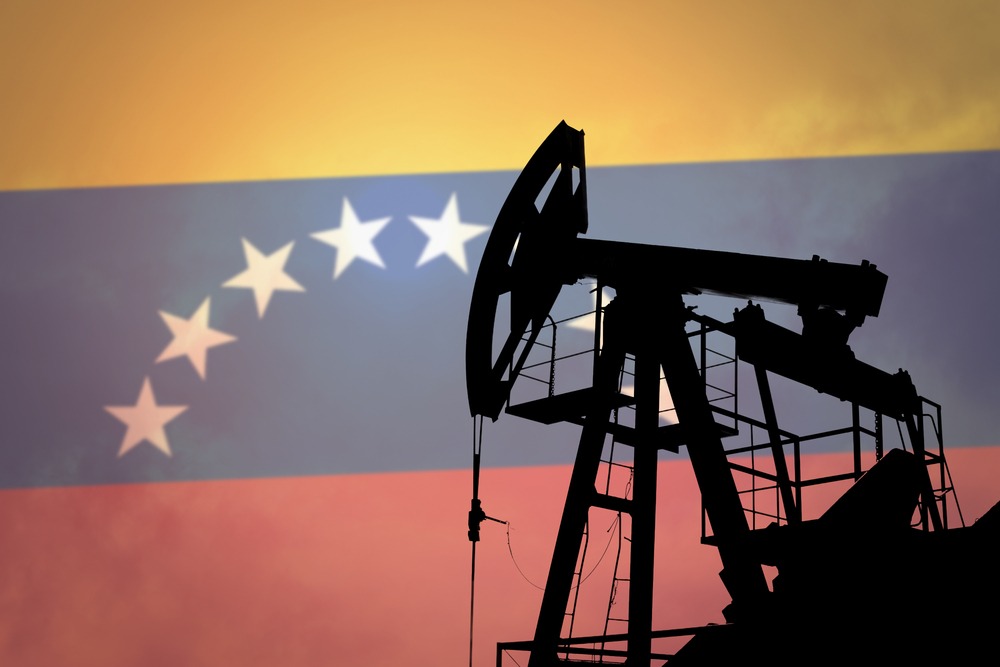 Oil well pumping crude with the Venezuelan flag in the background, symbolising the country’s vast oil reserves and energy wealth