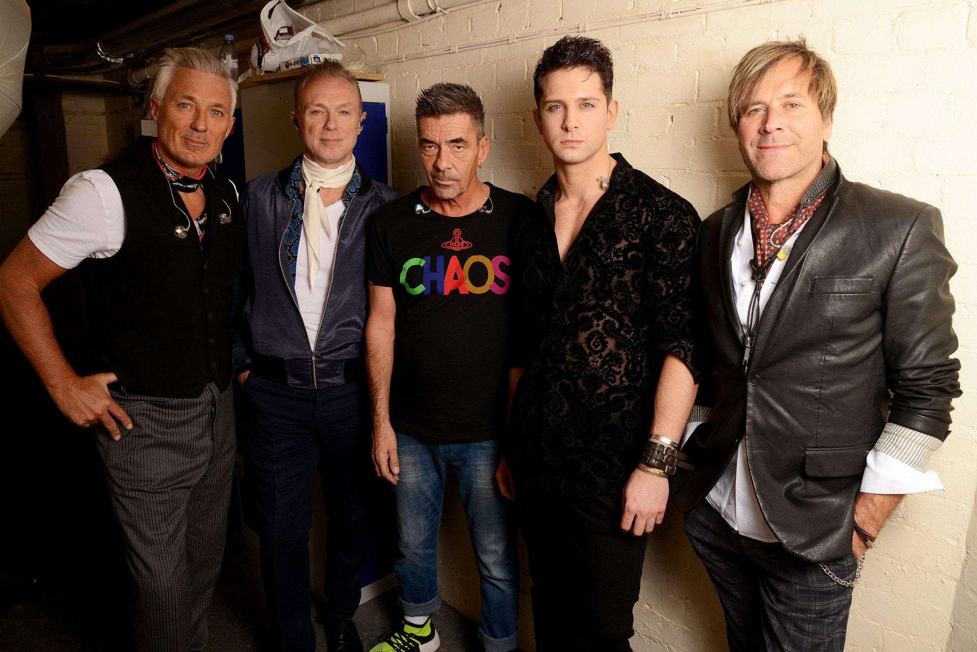 Ross Davidson backstage with Spandau Ballet members, preparing for a live performance during his brief tenure as the band’s frontman.
