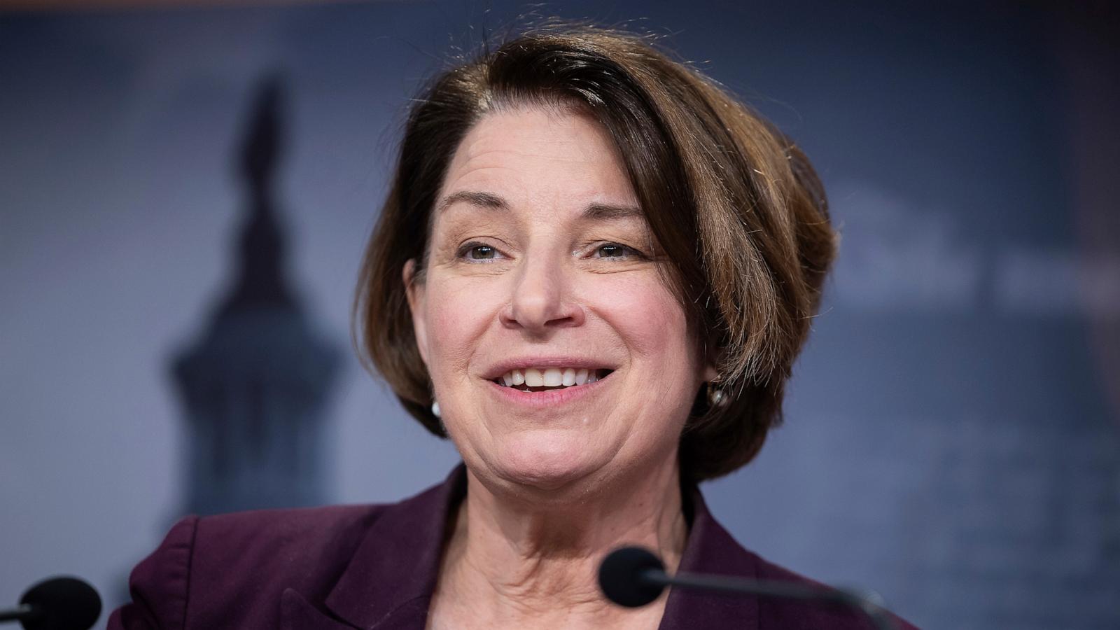 U.S. Sen. Amy Klobuchar speaks at a podium during a public appearance