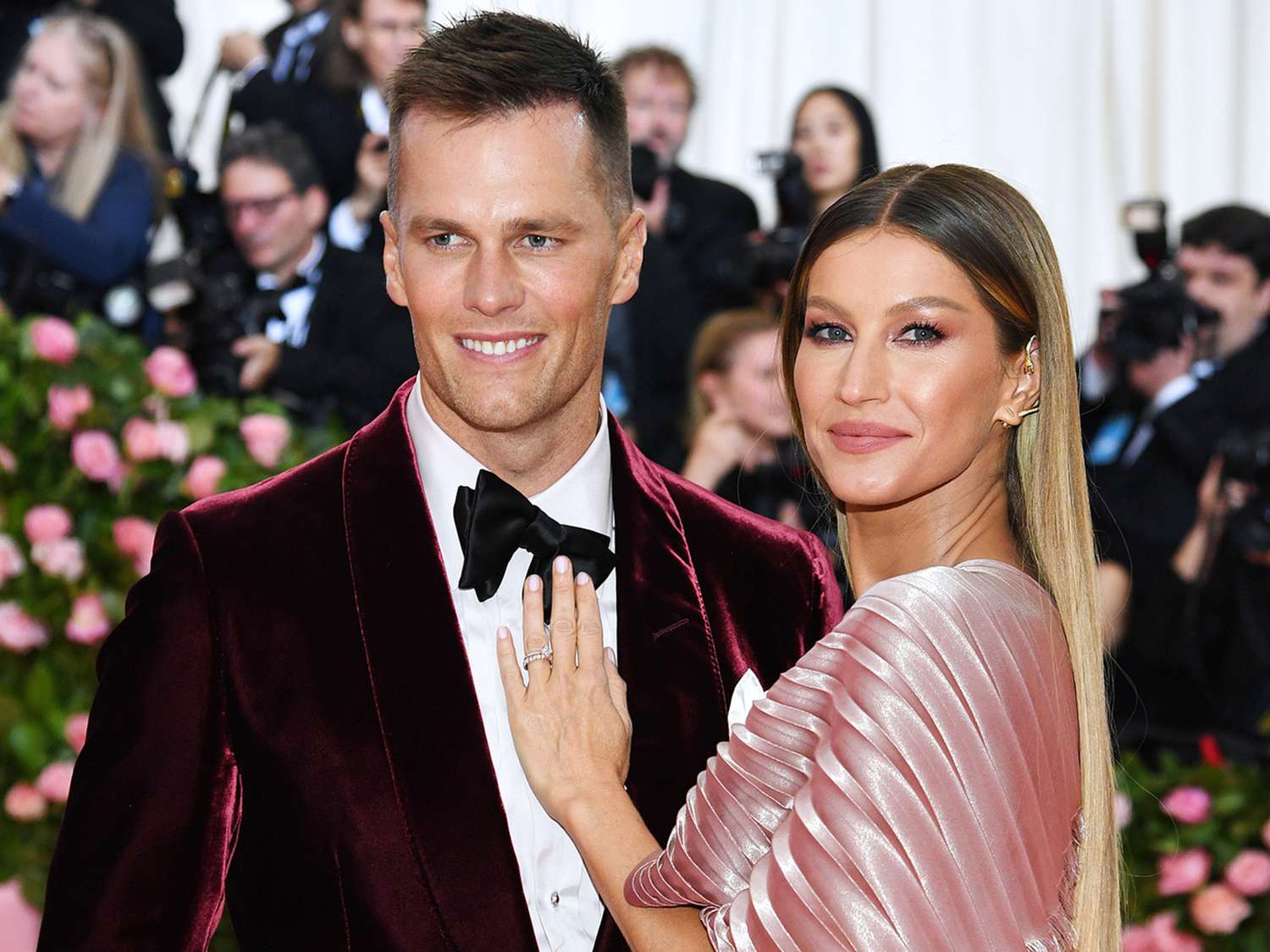 Gisele Bündchen and Tom Brady on the red carpet, showcasing their past high-profile marriage and joint public appearances.