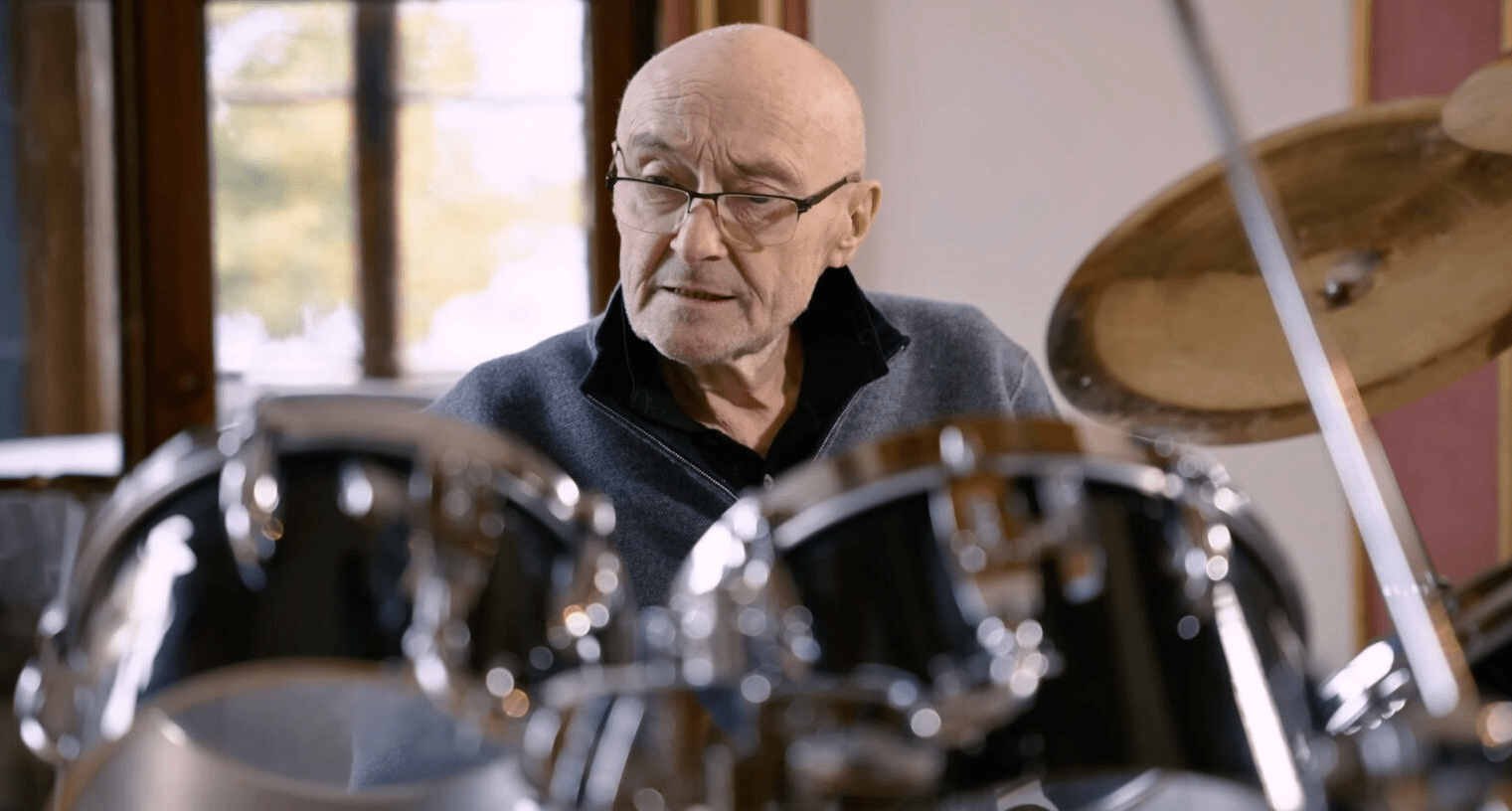Phil Collins performing live during a Genesis concert in later years