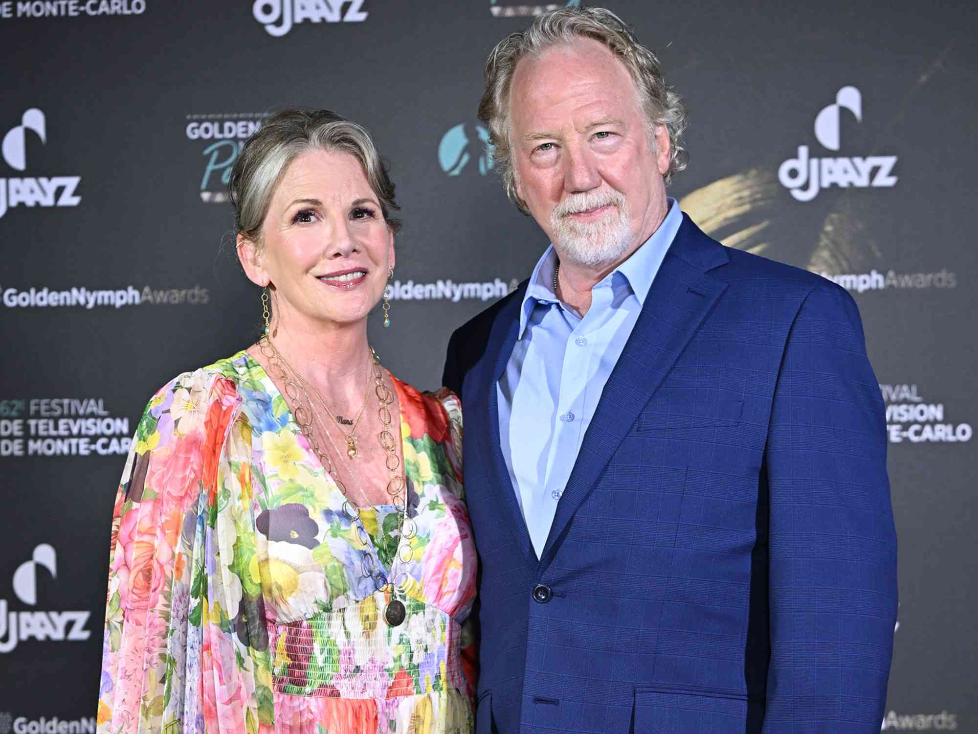 Timothy Busfield and Melissa Gilbert posing together on the red carpet, highlighting their long-standing Hollywood careers