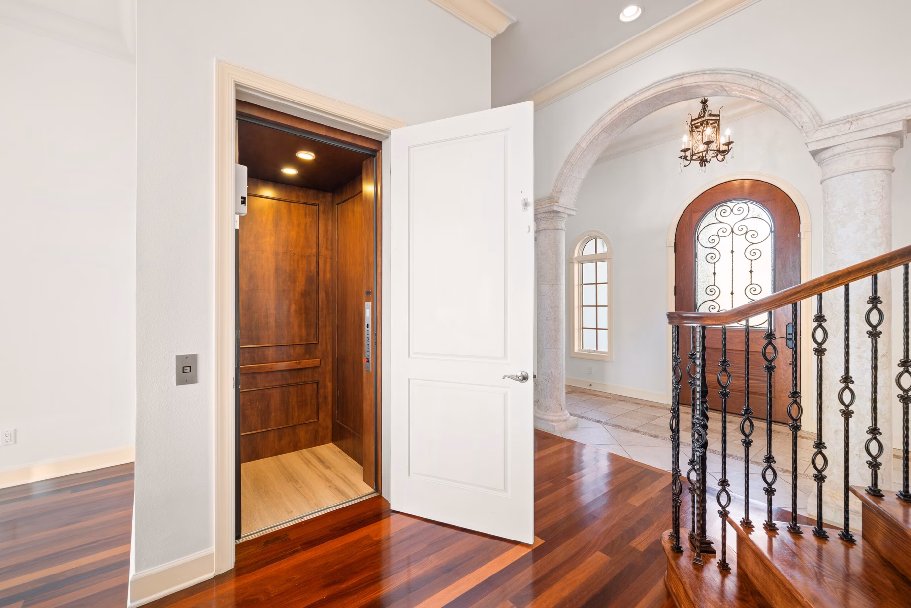 Private elevator inside Hulk Hogan’s Clearwater mansion, featuring sleek design, polished metal finishes, and access to multiple floors.