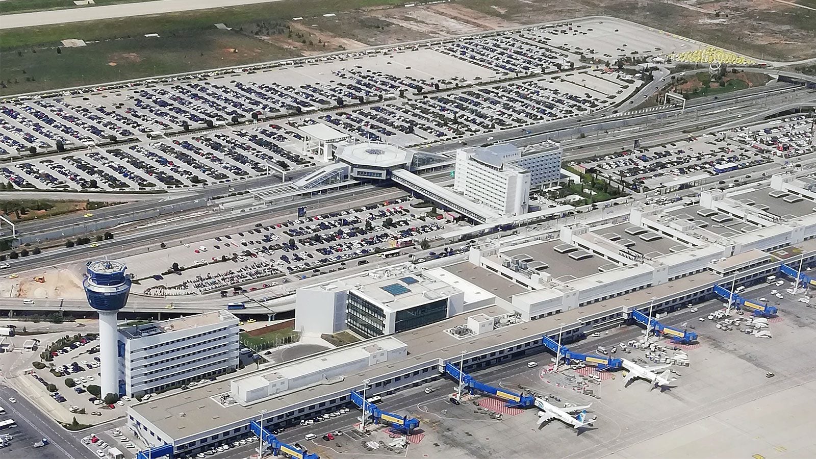 Athens International Airport runway and terminal representing €806M secured bond financing for expansion