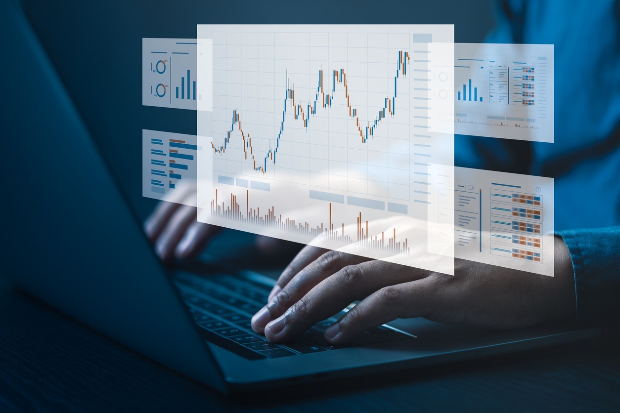 businessmen are analyzing stock market data, company revenue and net profit, future trends, marketing analysis, customer and sales trends, etc.