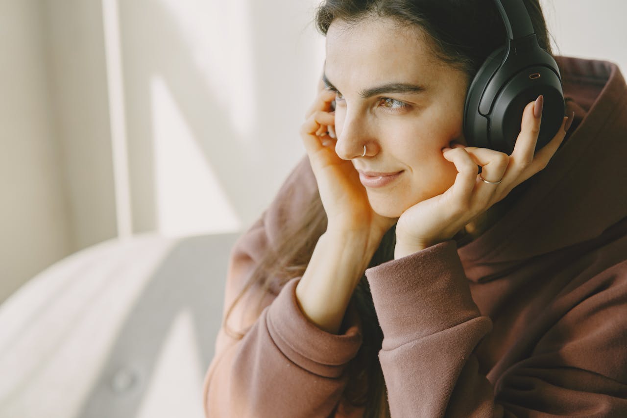 A Woman Wearing a Wireless Headphone
