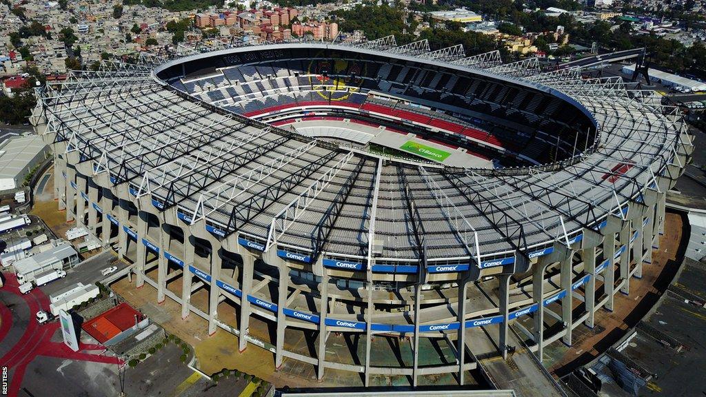 Football fans arriving at a FIFA World Cup stadium amid soaring ticket prices for the 2026 tournament