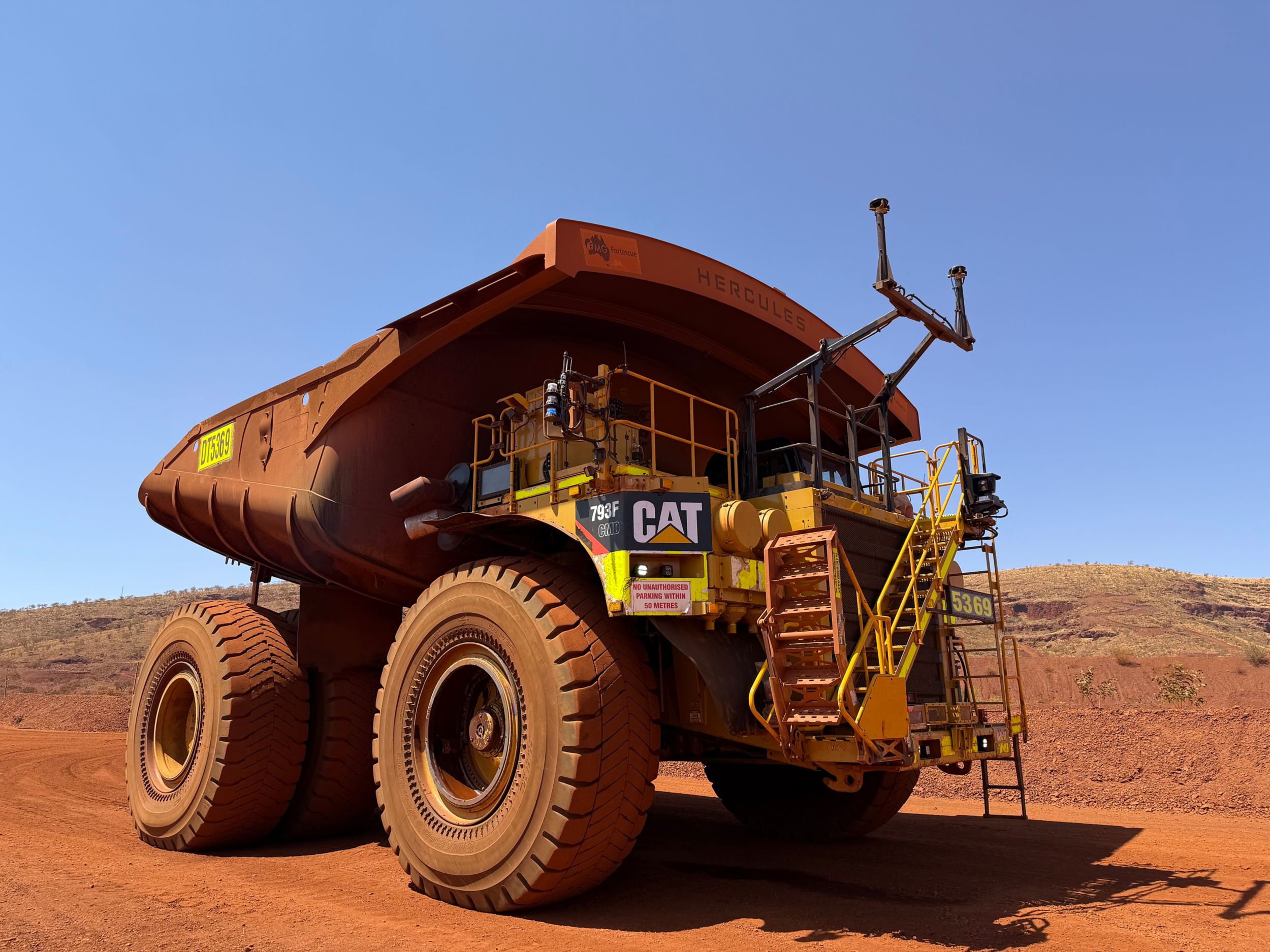 Diesel mining truck operating at an Australian iron ore mine during debate over fossil fuel tax breaks