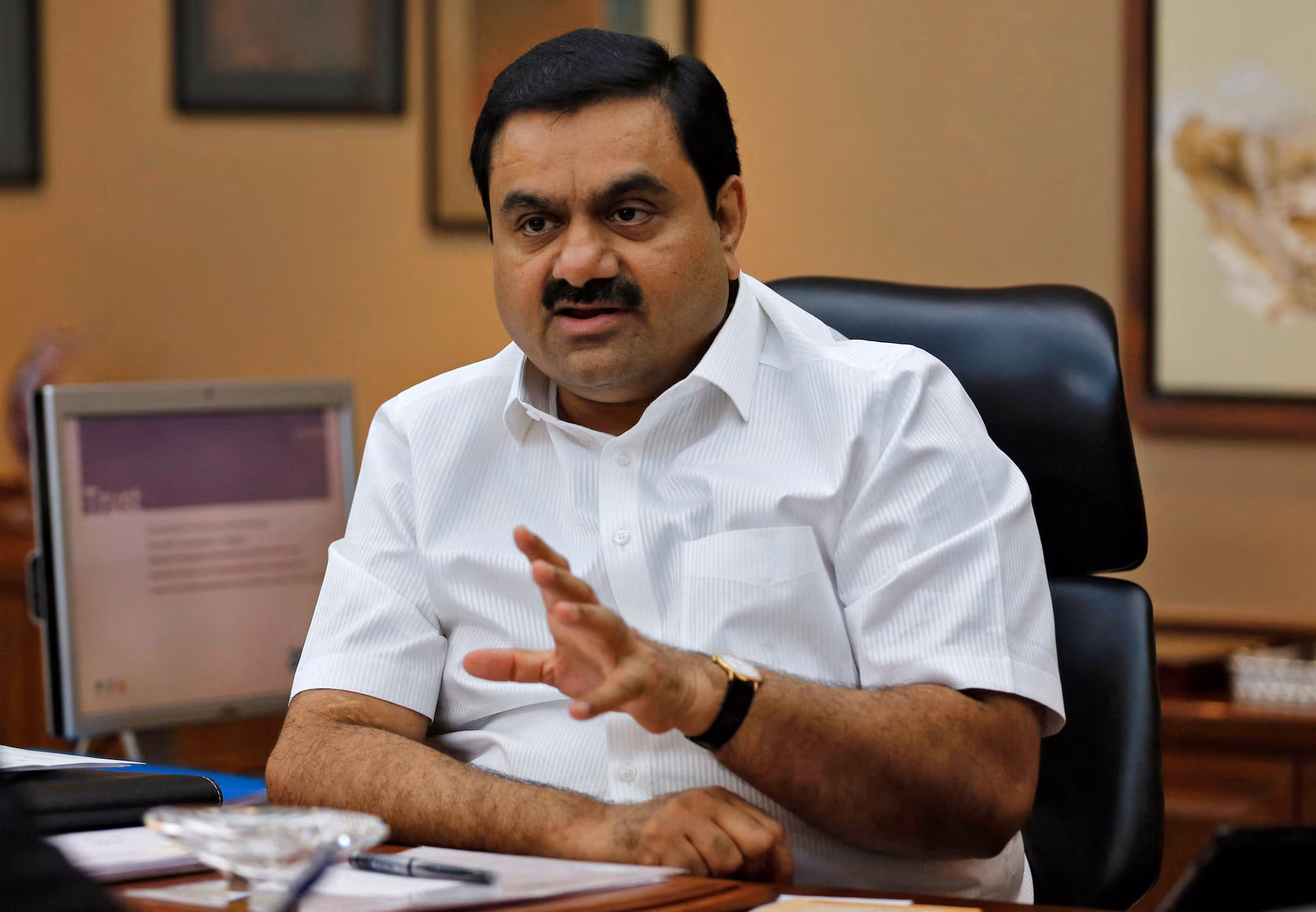 Gautam Adani speaking at a business event amid ongoing DOJ fraud case scrutiny and US investment discussions
