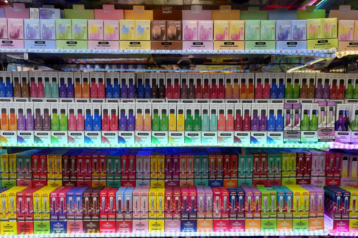 Flavored disposable vape products displayed inside an American retail store