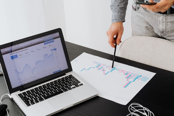laptop and charts